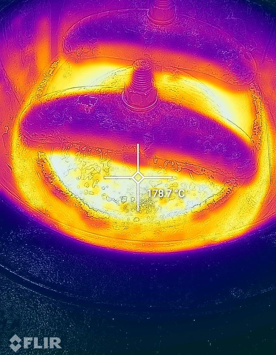 FLIR thermal image of a bare boiler manhole at 178.7 degrees C