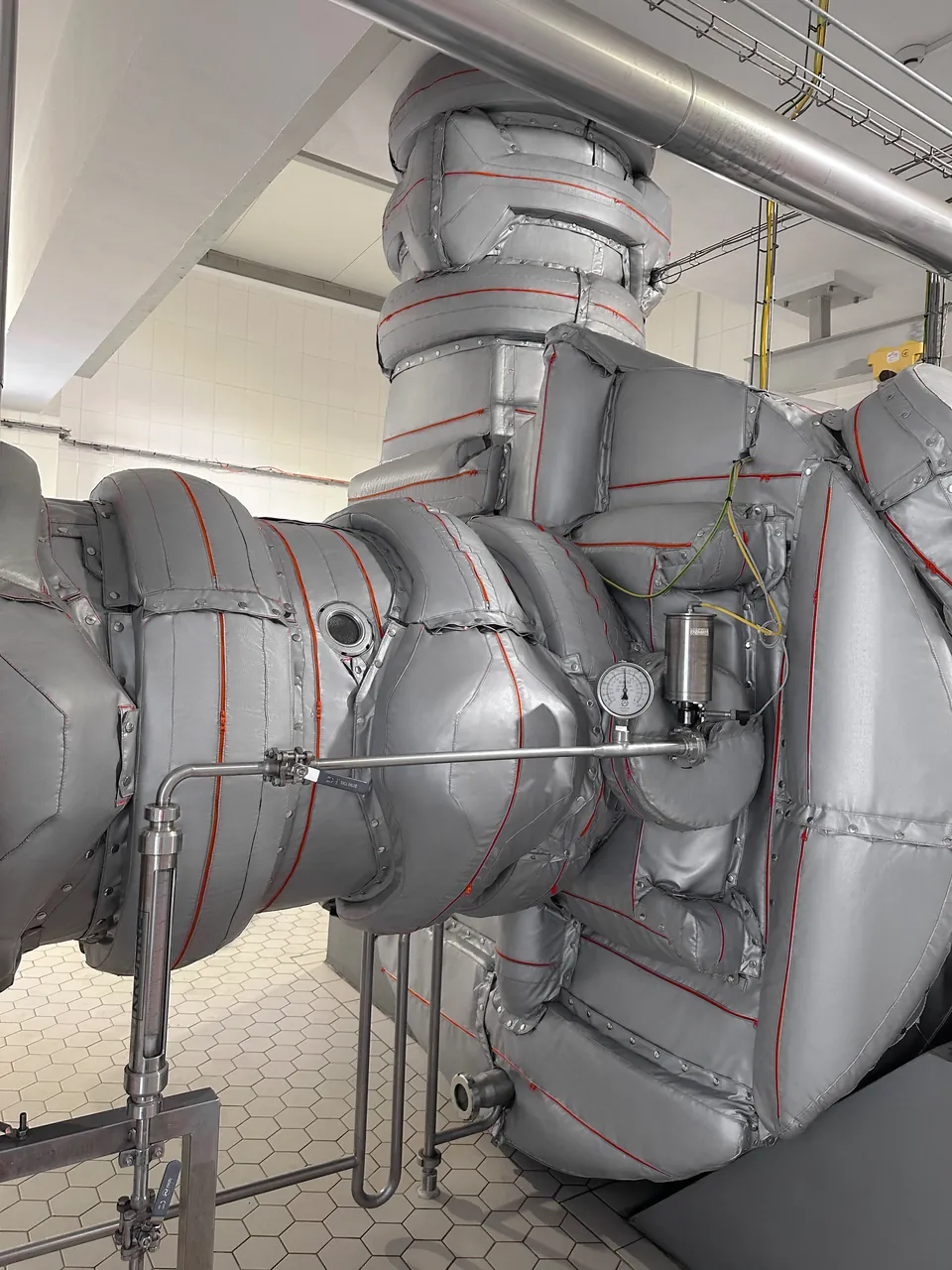 MVR suction duct and fan casing fitted with grey Inzonex Modular Insulation sections
