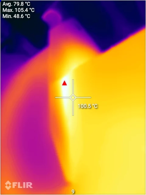 Close thermogram of the uninsulated top of a dryer, frame average 79.8 C, peak 105.4 C